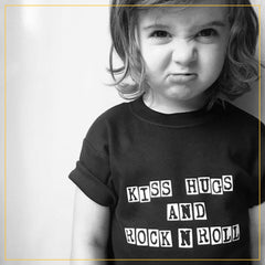 boy in a kiss hugs and rock n roll t-shirt